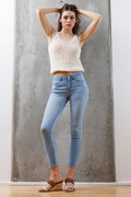 Mid Rise Destructed Ankle Skinny Jeans