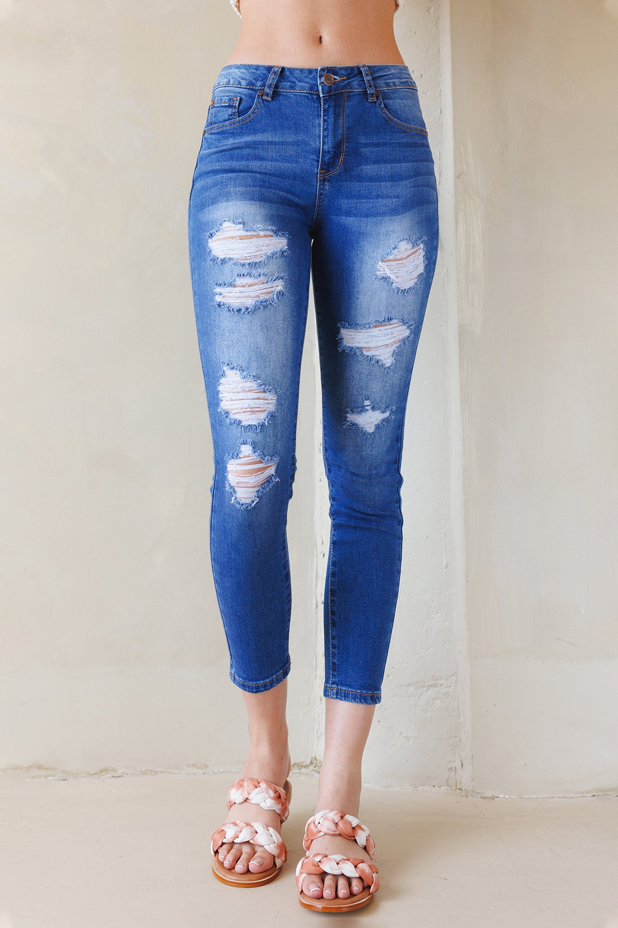 High Rise Destructed Skinny Jeans