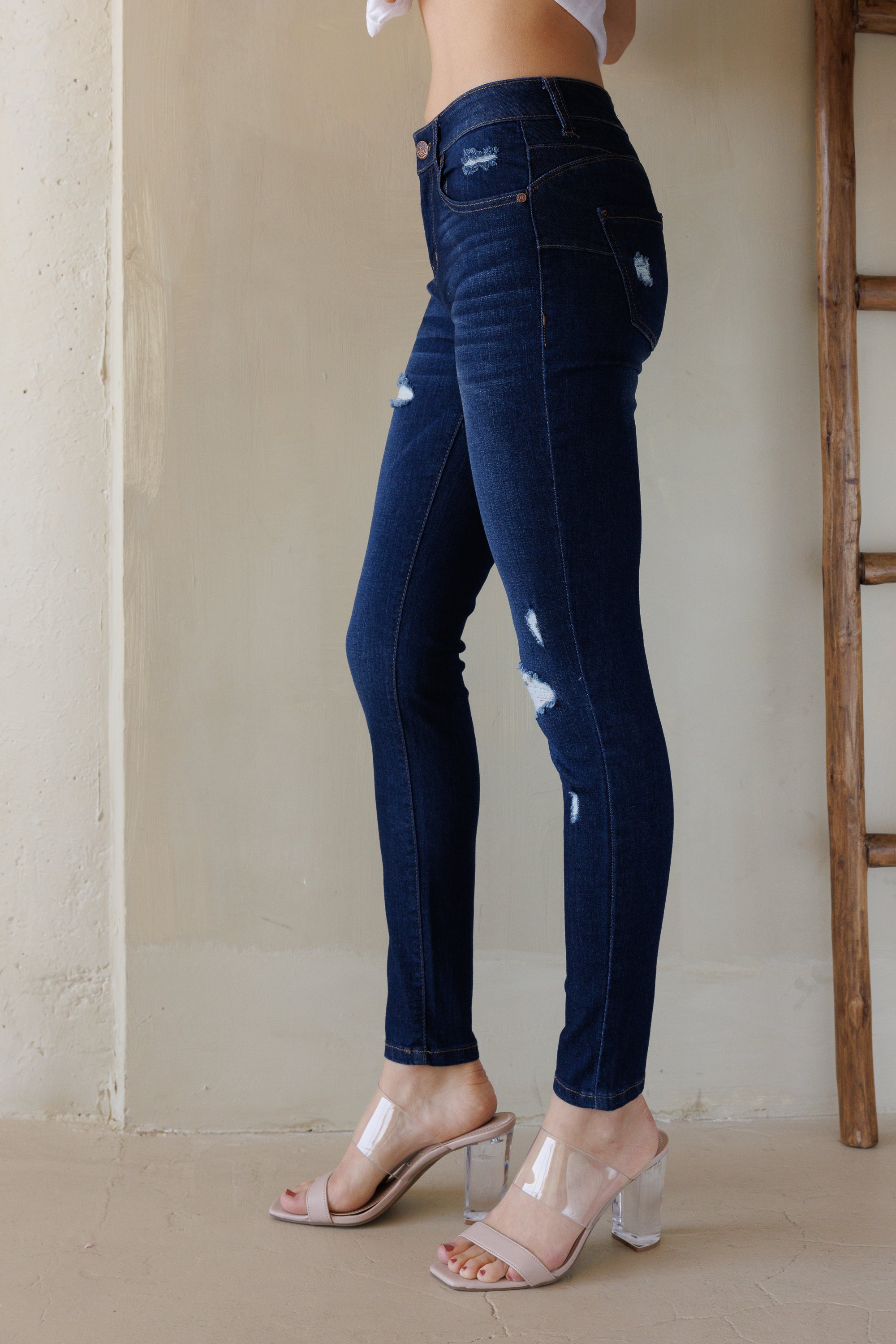 Mid Rise Destructed Skinny Jeans