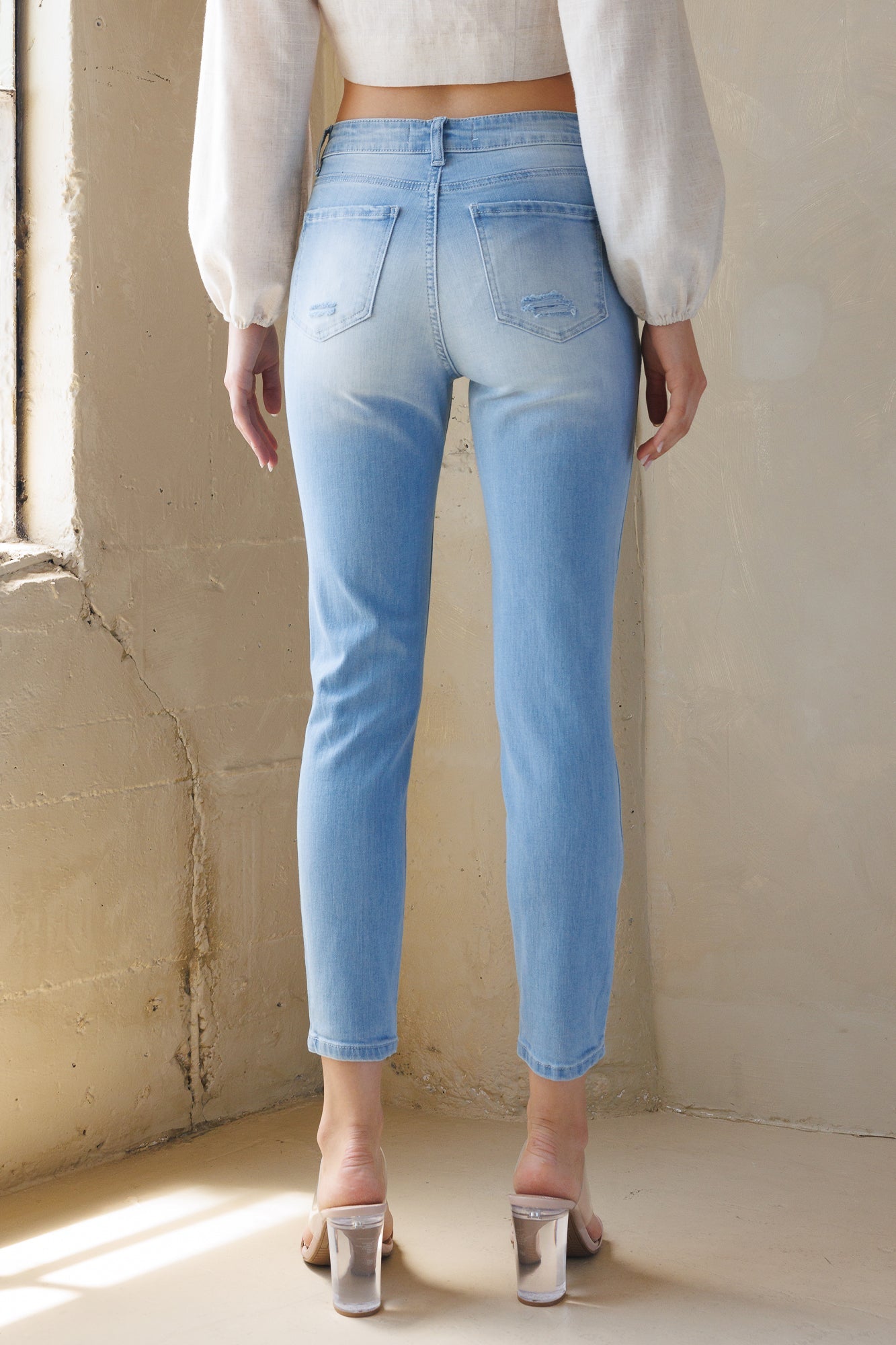 High Rise Destructed Faded Skinny Jeans