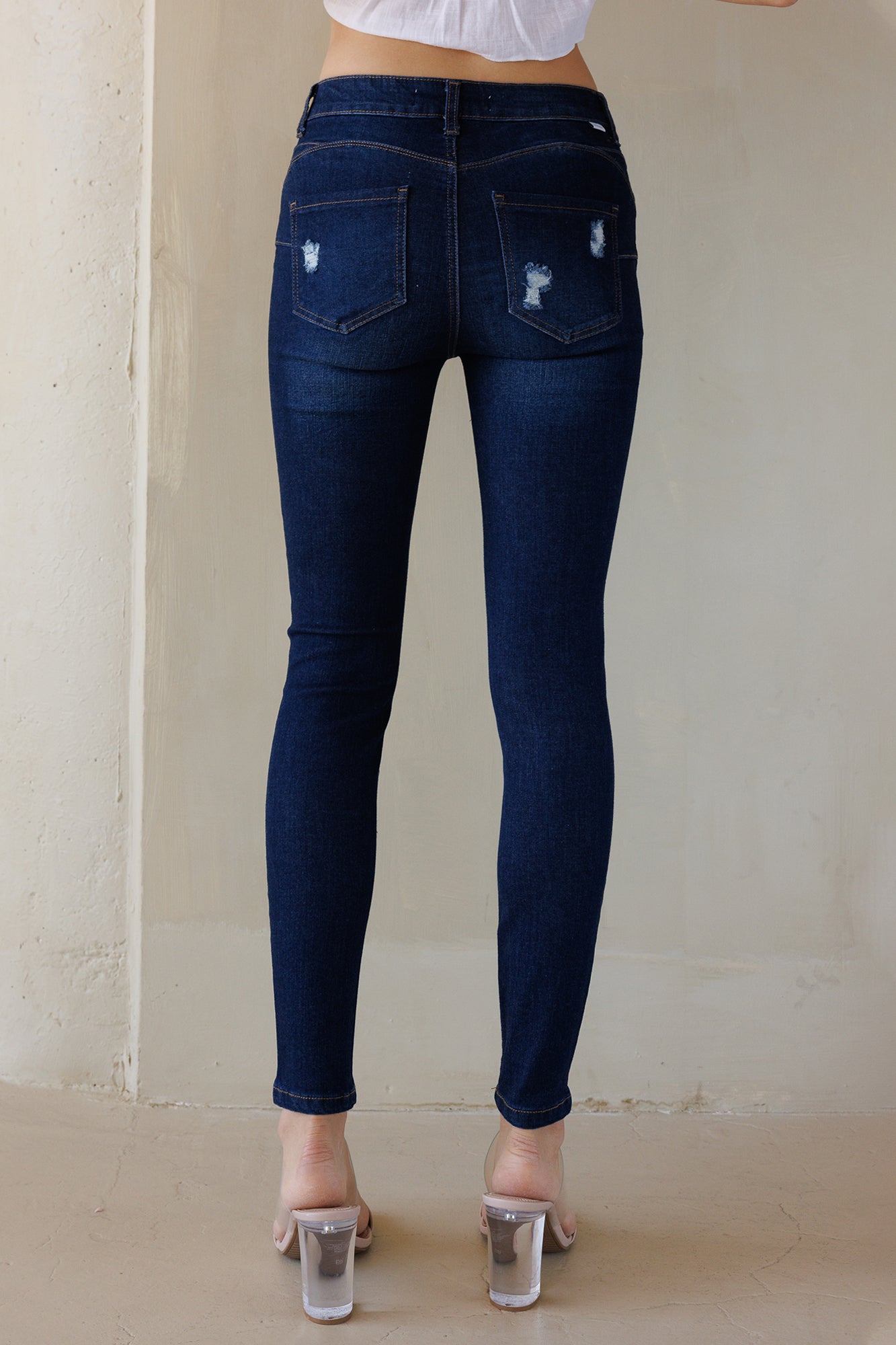 Mid Rise Destructed Skinny Jeans