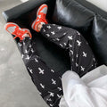 Trendy Cross Design Nine-Point Joggers
