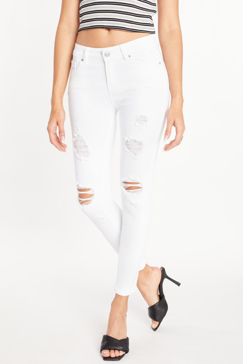 Mid Rise Destructed Ankle Skinny Jeans