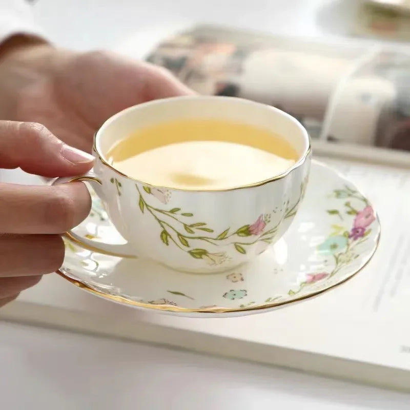 DecorBites™ Elegant Gold Flower Cup & Saucer Set - Delicate Porcelain Tea Coffee Mug