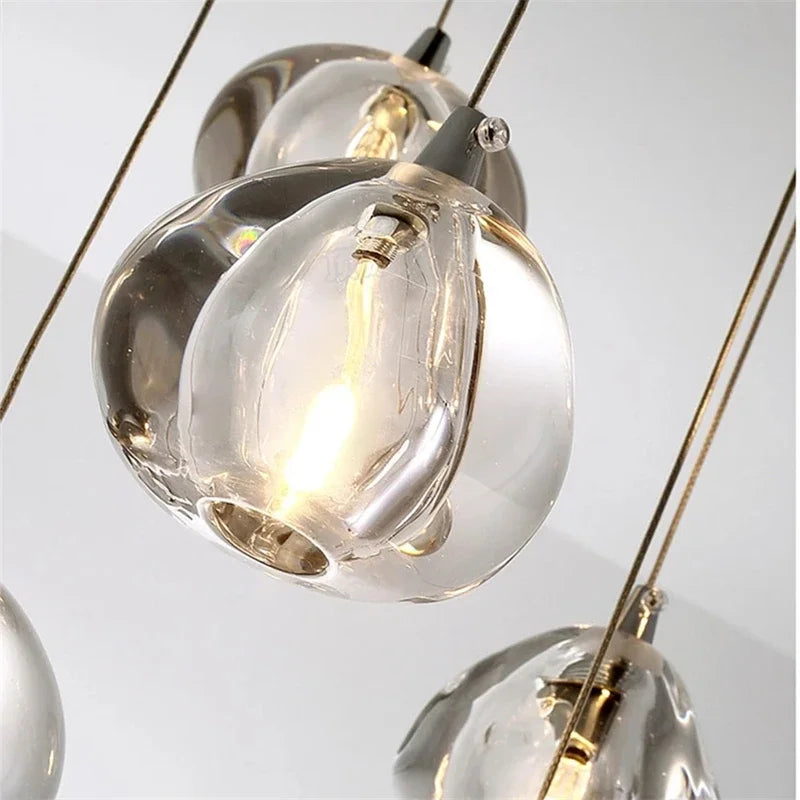 DecorBites™ Crystal Water Droplet Chandelier: Modern LED Staircase Pendant Light - Luxury Ball Hanging Lamp