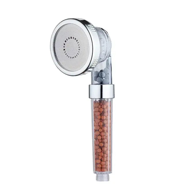 Adjustable shower head with chrome accents and filter beads bathroom
