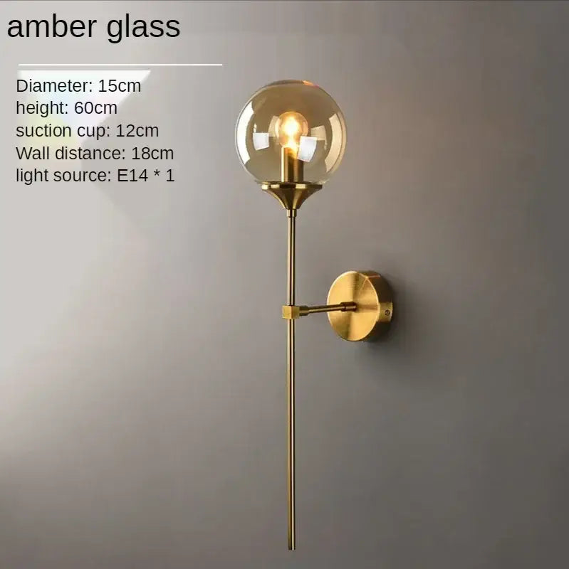 Amber glass ball sconce light brass finish bedroom wall lamp