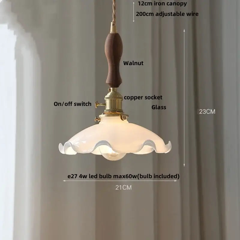 Amber glass pendant light with brass knob switch for dining room