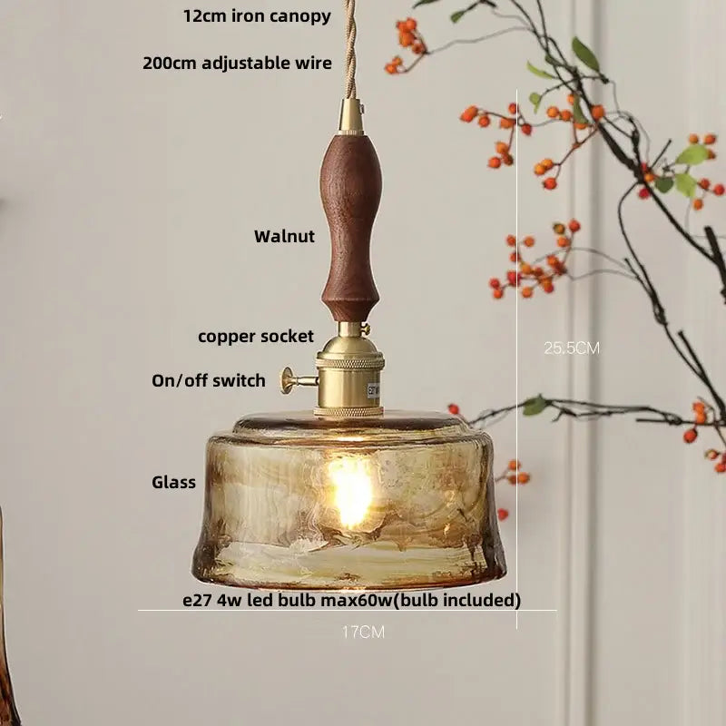 Amber glass pendant light with brass knob switch for dining room