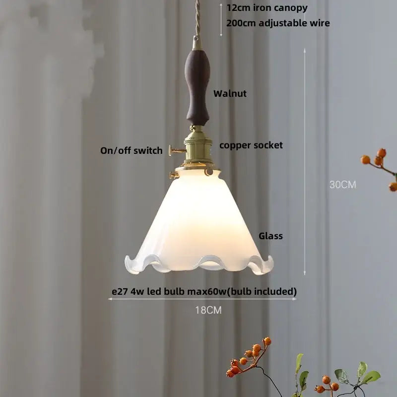 Amber glass pendant light with brass knob switch for dining room