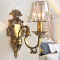 Antique brass wavy arm sconce bedroom wall lamp with crystal shade