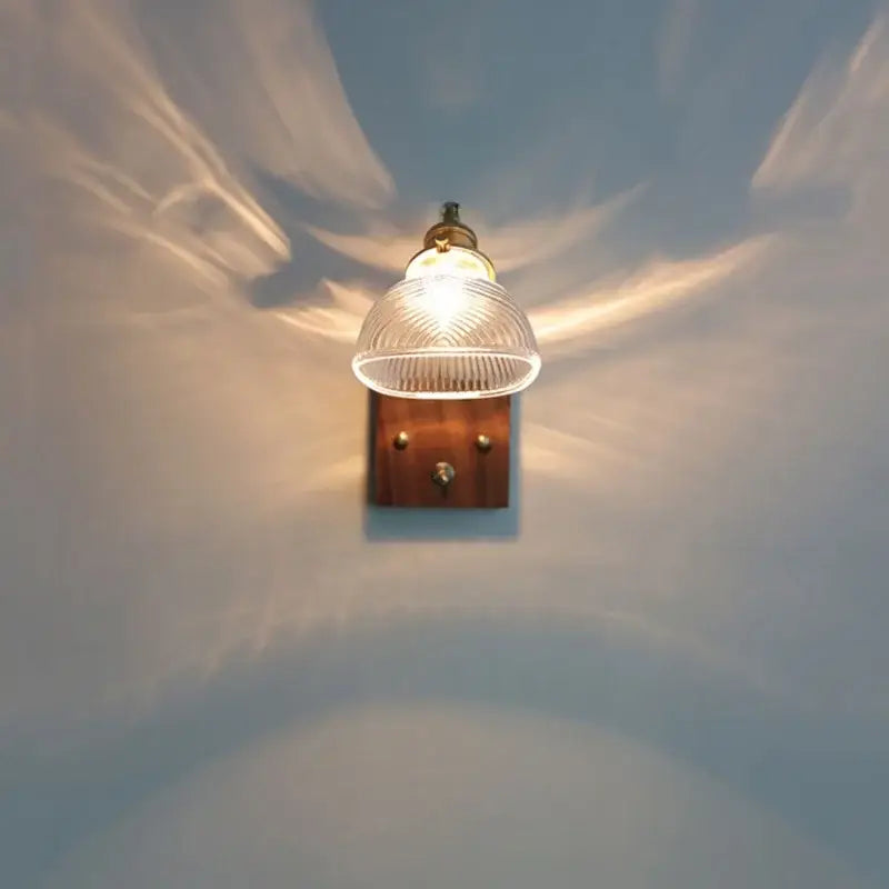 Antique walnut and brass clear glass wall light stair sconce