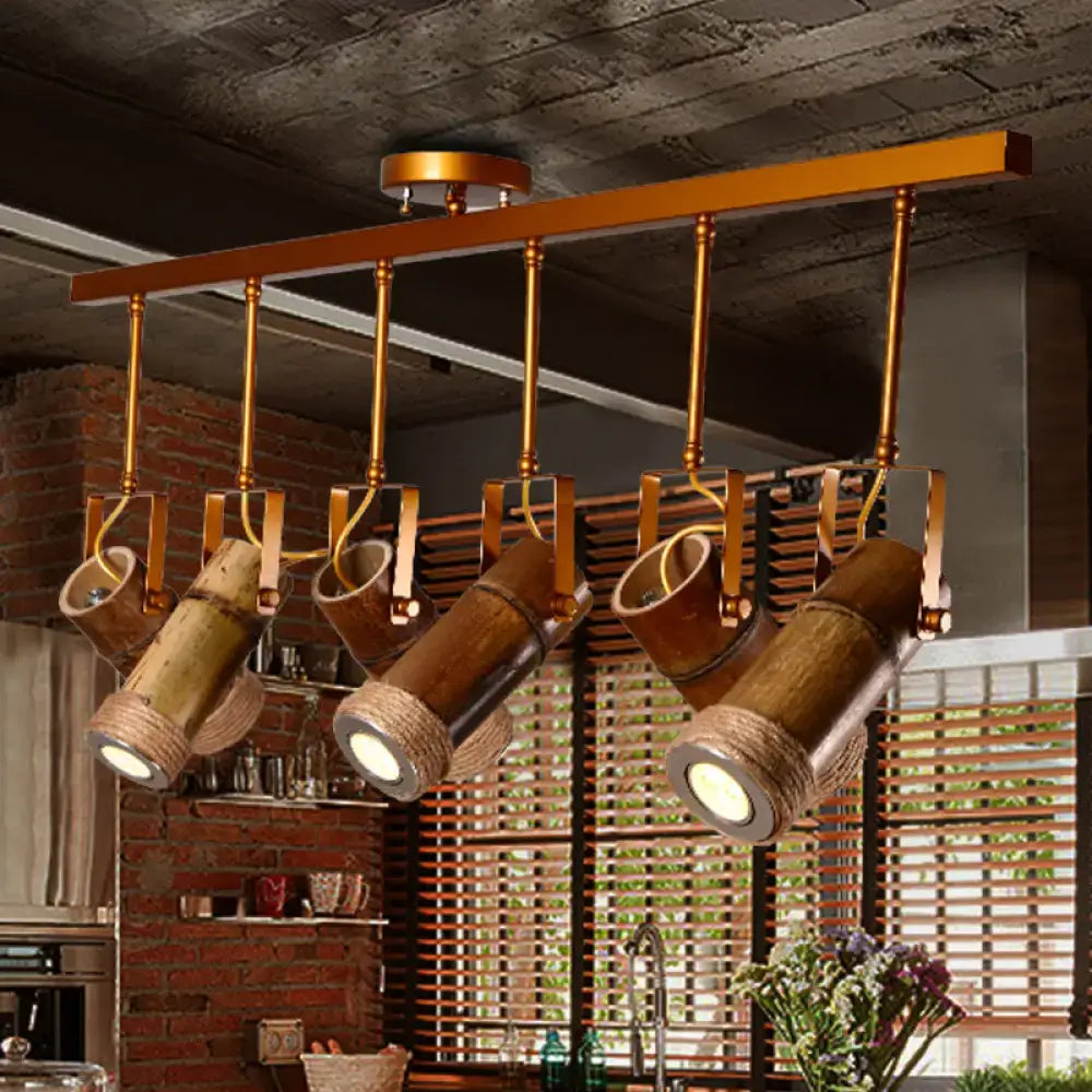 Industrial bamboo tube kitchen island light with copper spotlights