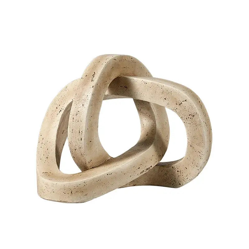 Beige speckled geometric interlocking loop knot living room sculpture