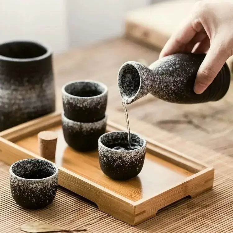 Black speckled ceramic wine sake set with heater for dining room