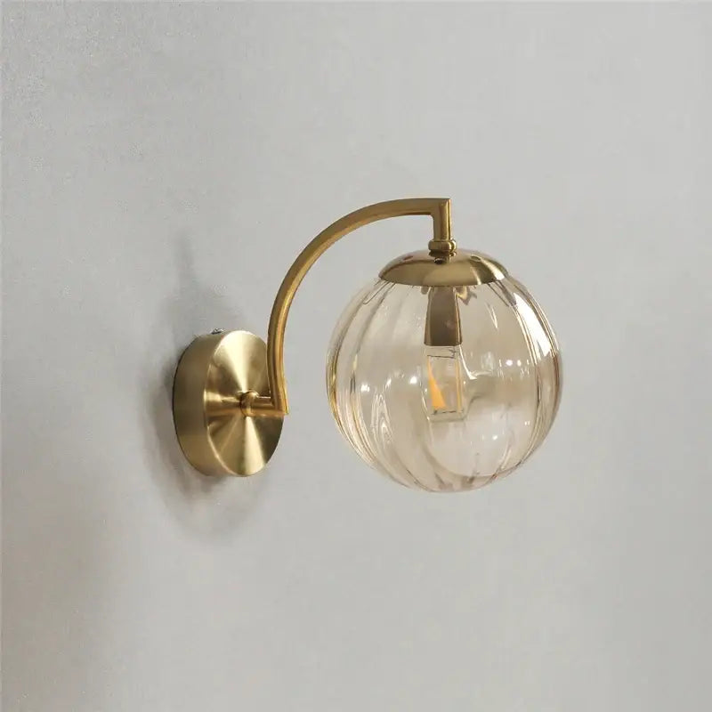Blue and brass colored glass ball wall lamp for bedroom lighting