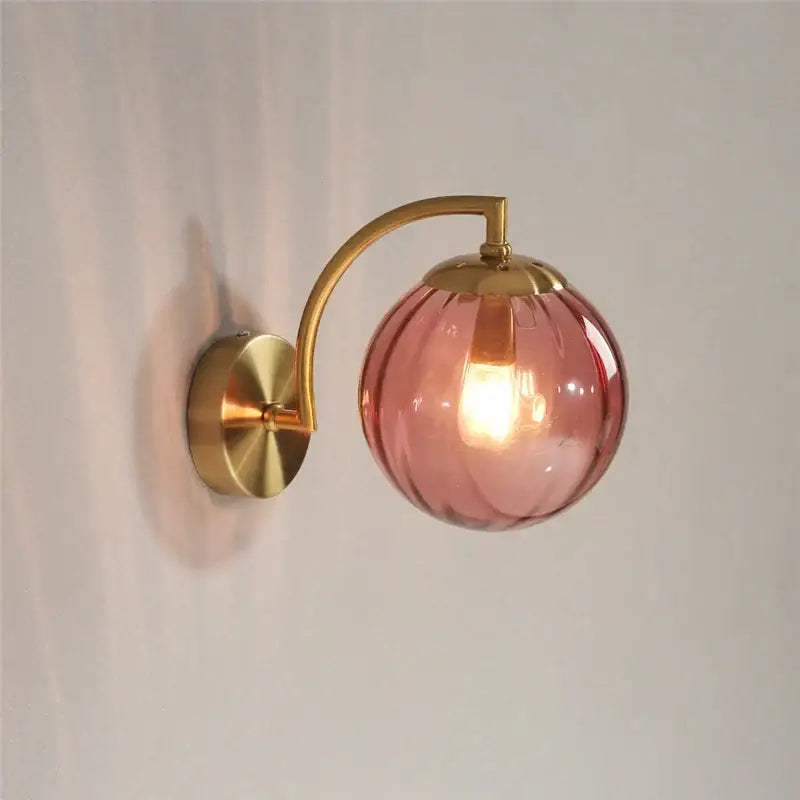 Blue and brass colored glass ball wall lamp for bedroom lighting