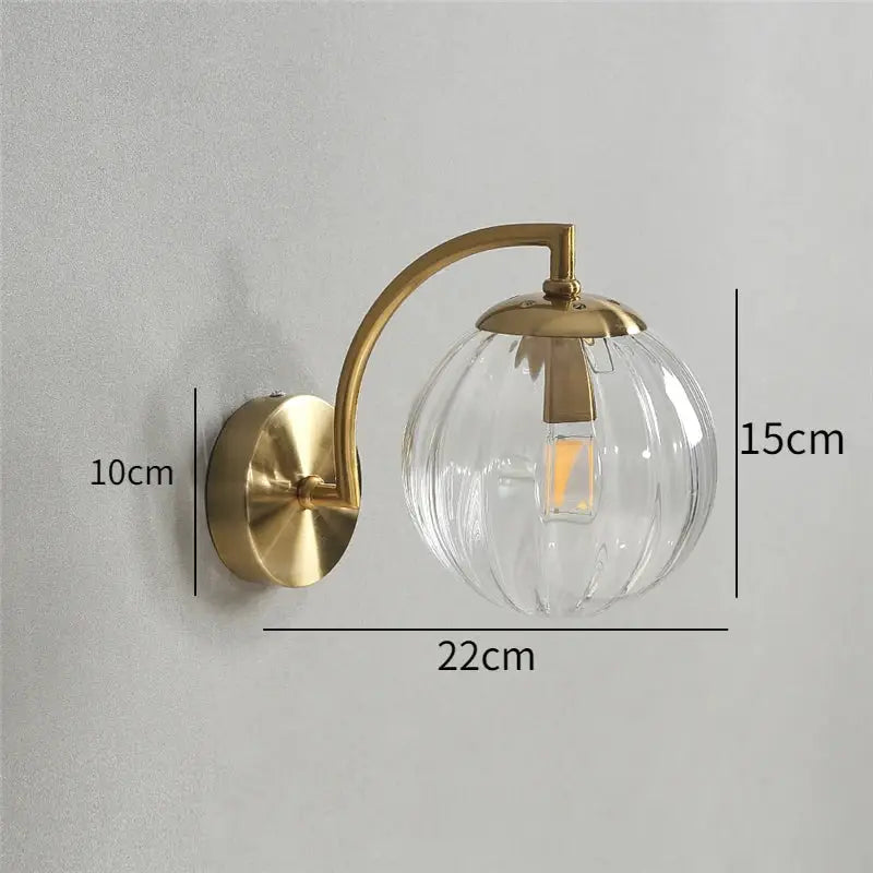 Blue and brass colored glass ball wall lamp for bedroom lighting