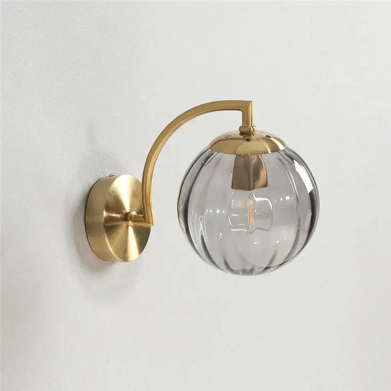 Blue and brass colored glass ball wall lamp for bedroom lighting