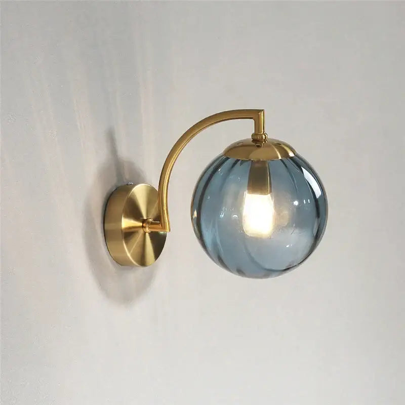 Blue and brass colored glass ball wall lamp for bedroom lighting