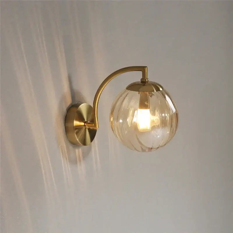 Blue and brass colored glass ball wall lamp for bedroom lighting