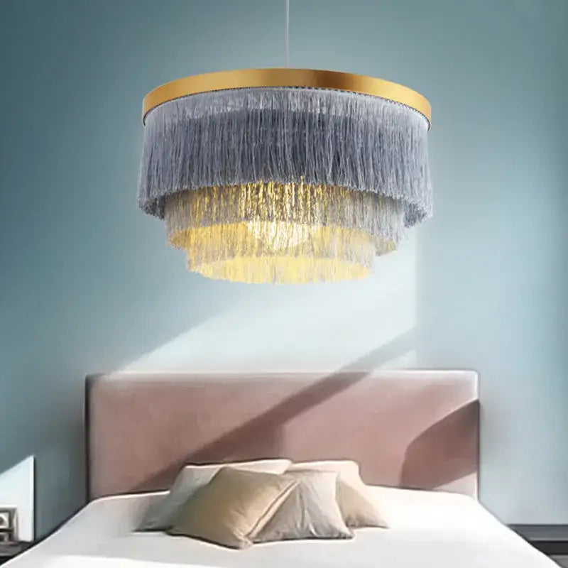 Bohemian gold tiered chandelier gray & golden fringe bedroom light