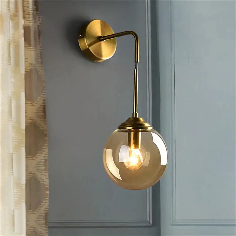 Brass amber glass ball wall light for bedroom and living room