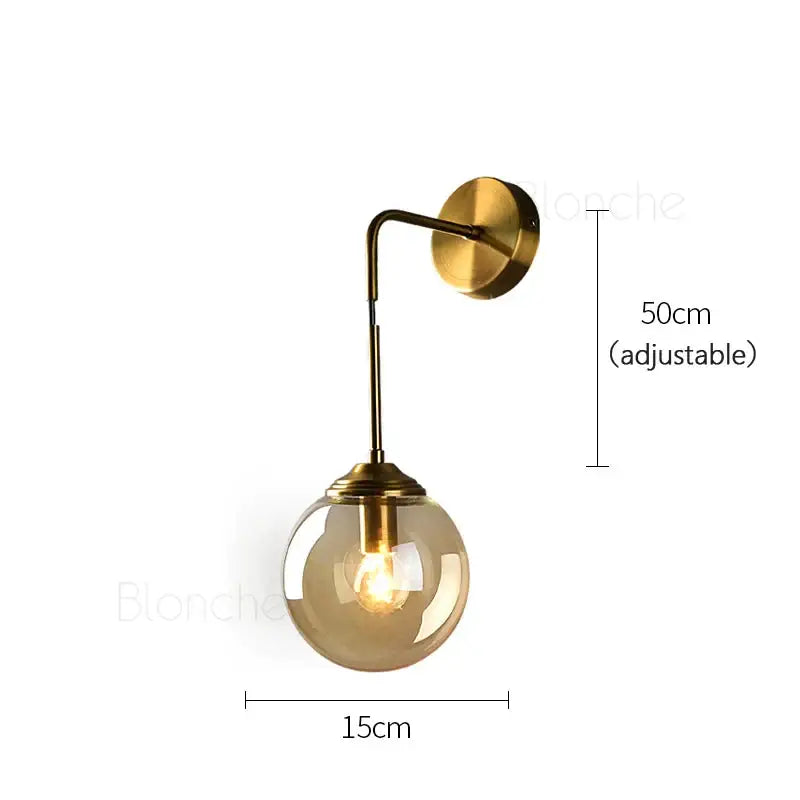 Brass amber glass ball wall light for bedroom and living room