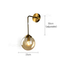 Brass amber glass ball wall light for bedroom and living room