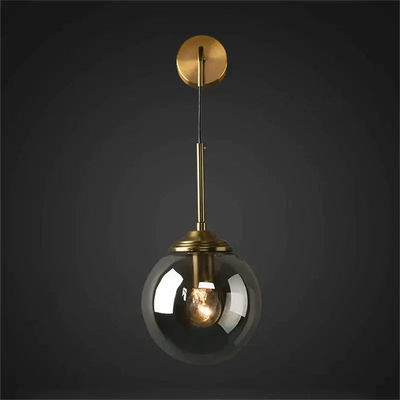 Brass amber glass ball wall light for bedroom and living room