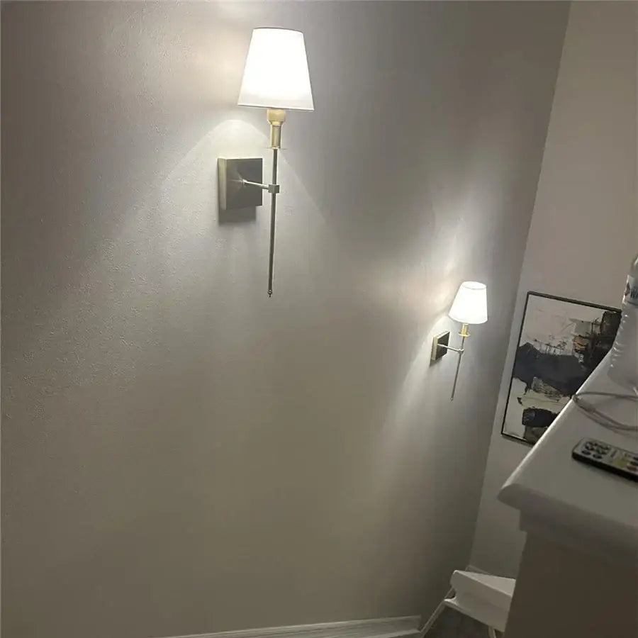 Brass and white cloth lampshade wall sconce pair for bathroom mirror