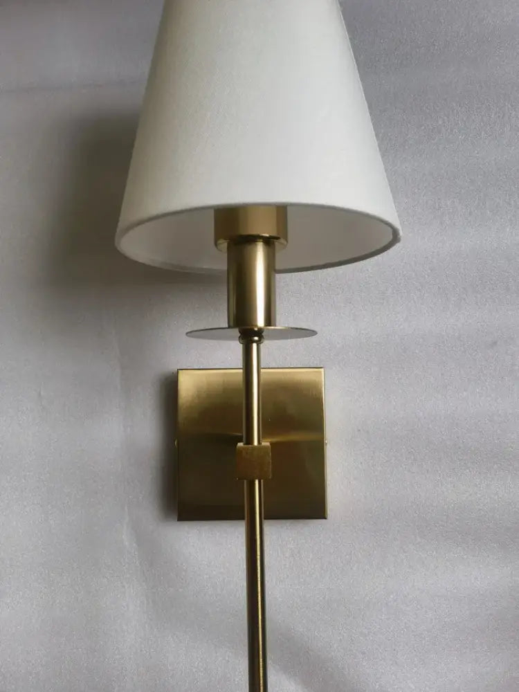 Brass and white cloth lampshade wall sconce pair for bathroom mirror