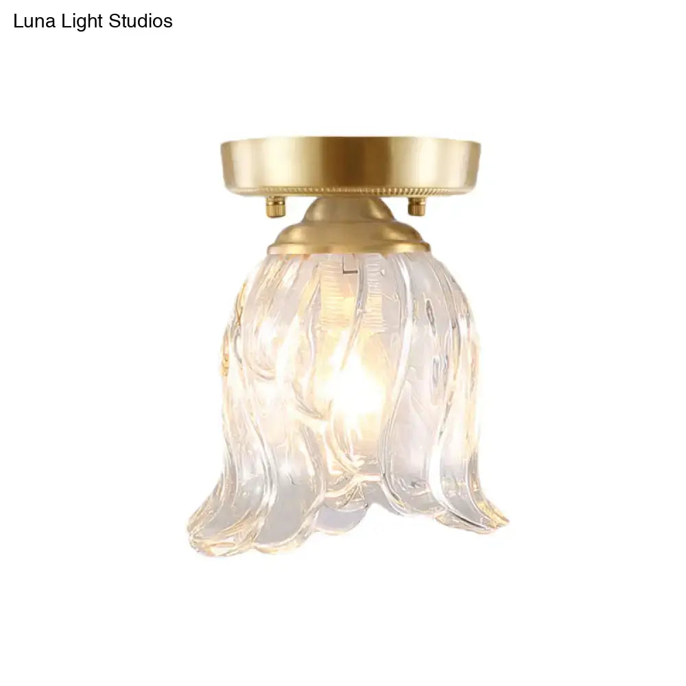 Brass semi flush mount with clear fluted glass for living room