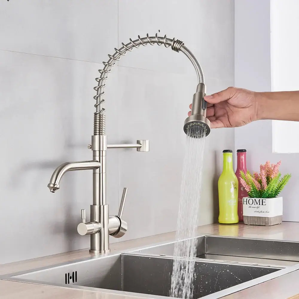 Brushed nickel kitchen faucet with pull down sprayer and spring hose