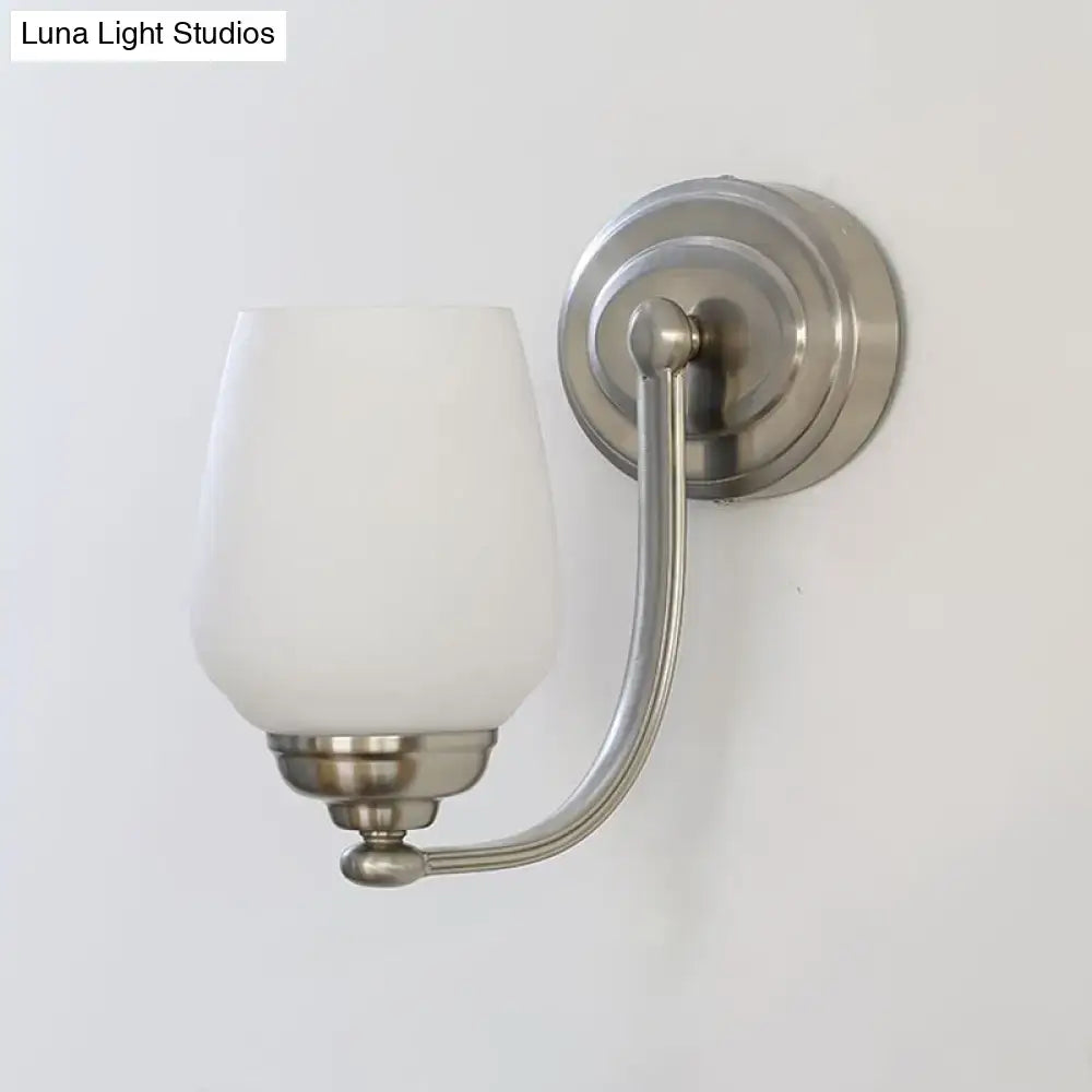 Brushed nickel milk glass wall lamp for stairways