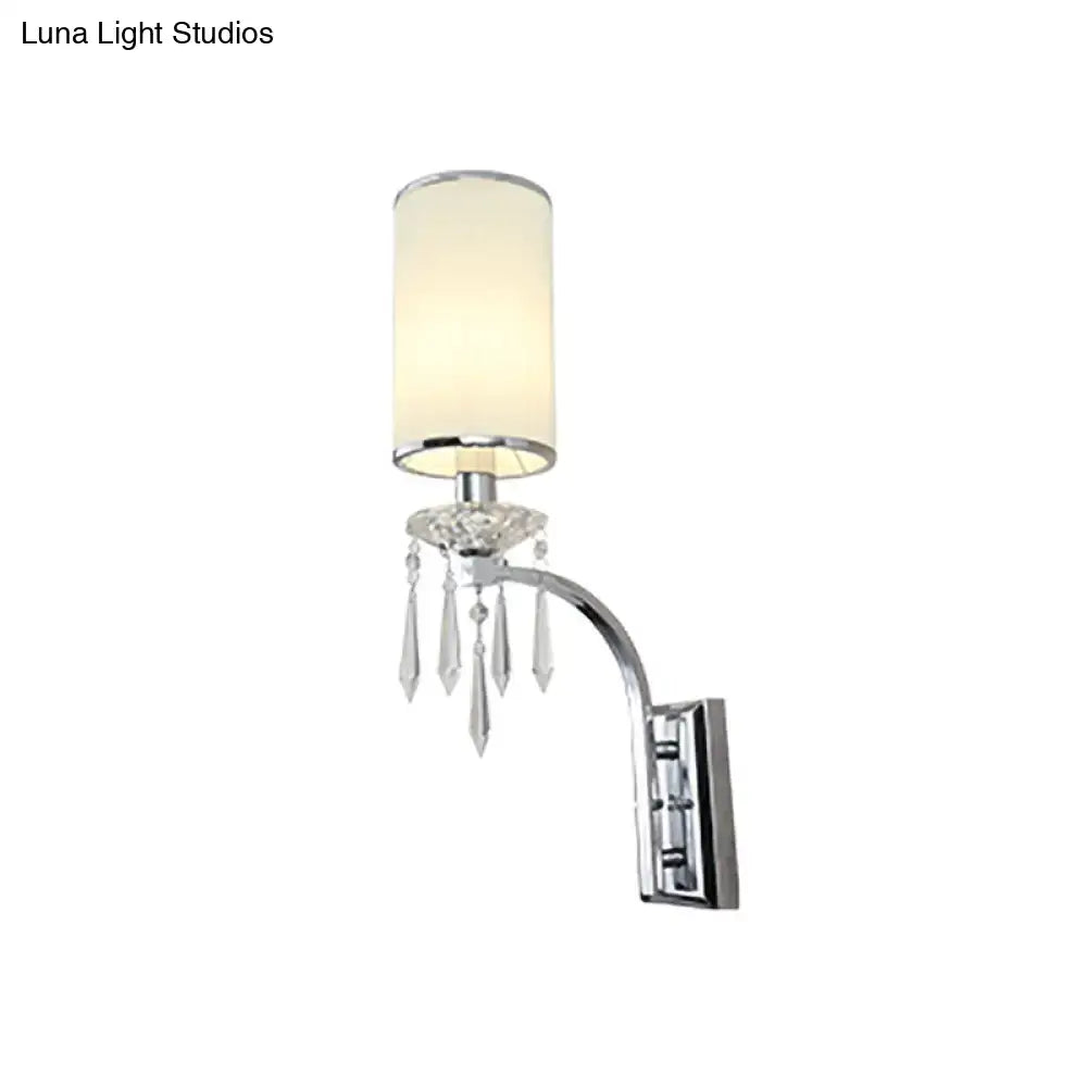 Chrome wall mounted sconce with crystal ribbed shade for living room