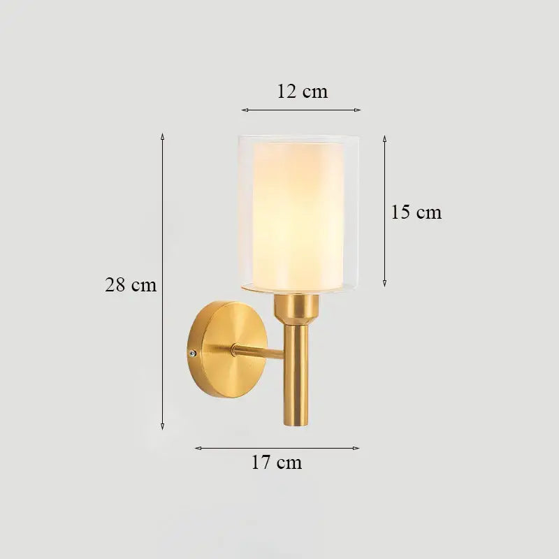 Classic brass glass wall sconce with frosted shade for bedroom