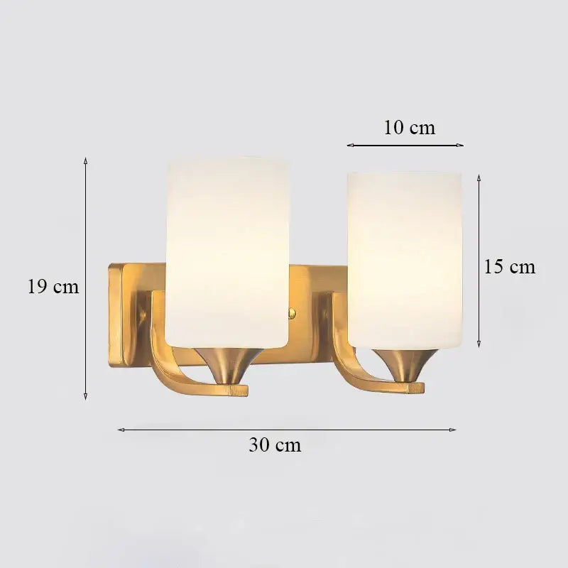 Classic brass glass wall sconce with frosted shade for bedroom
