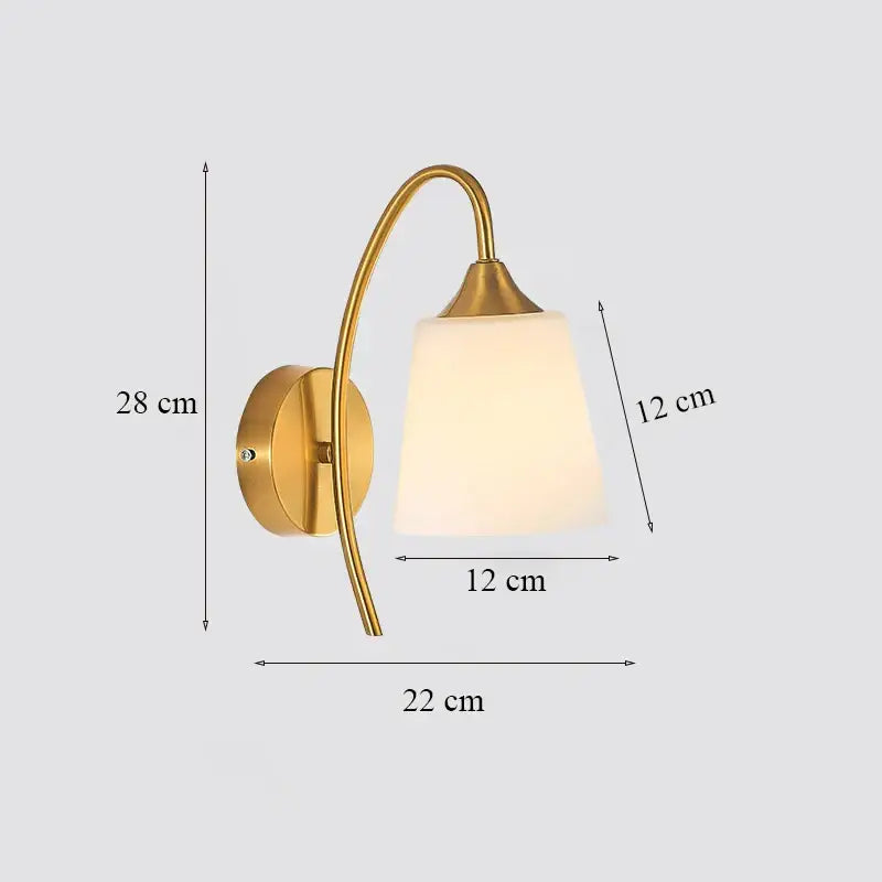 Classic brass glass wall sconce with frosted shade for bedroom