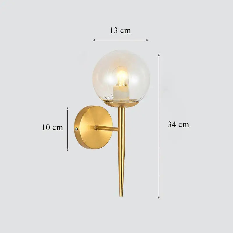 Classic brass glass wall sconce with frosted shade for bedroom