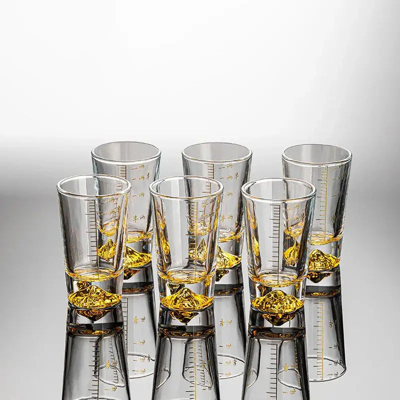 Clear glass liquor cup set with measurement markings dining room glass