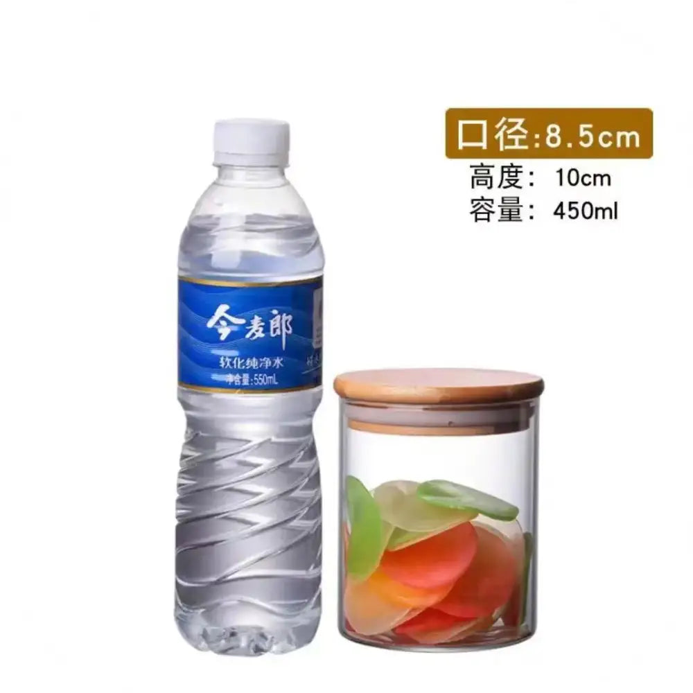 Clear glass storage jars with bamboo lids for kitchen organization