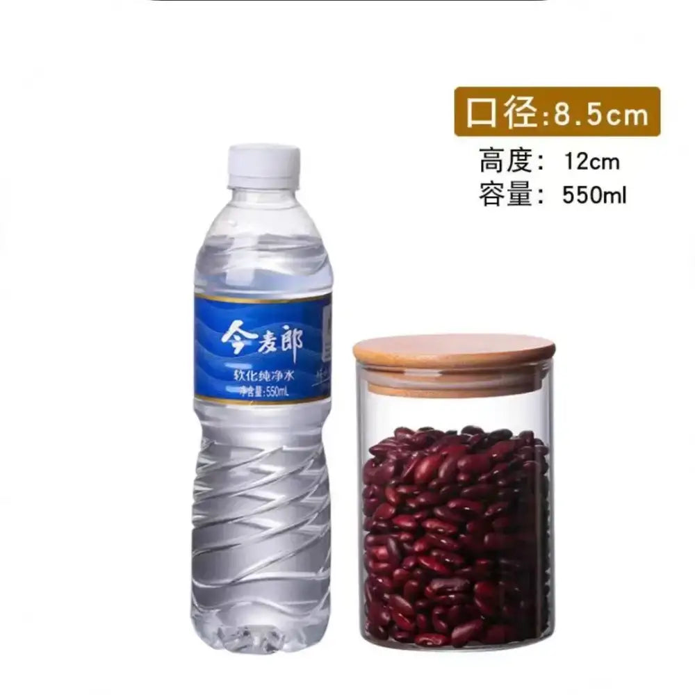 Clear glass storage jars with bamboo lids for kitchen organization