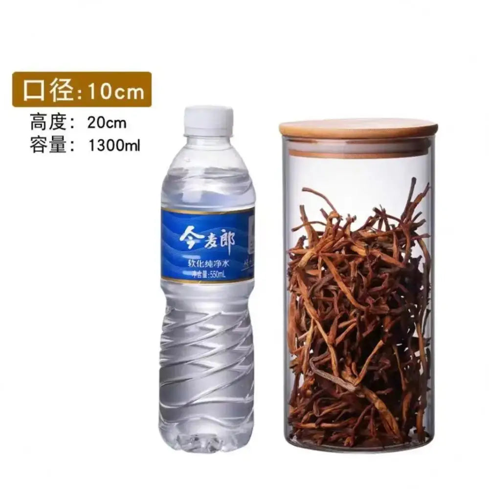 Clear glass storage jars with bamboo lids for kitchen organization