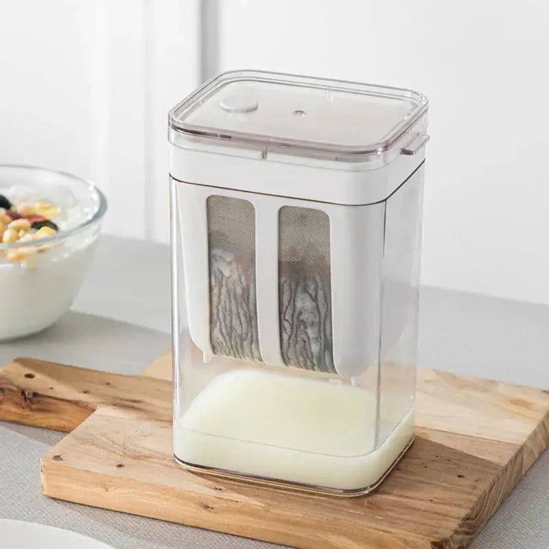 Clear greek yogurt maker with white lid and mesh filter kitchen