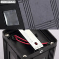 Contemporary black solar lantern outdoor wall light with white warm lighting