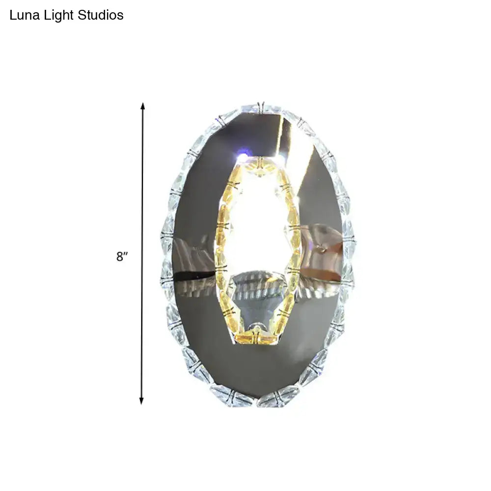 Contemporary chrome crystal oval light fixture warm white bedroom mirror