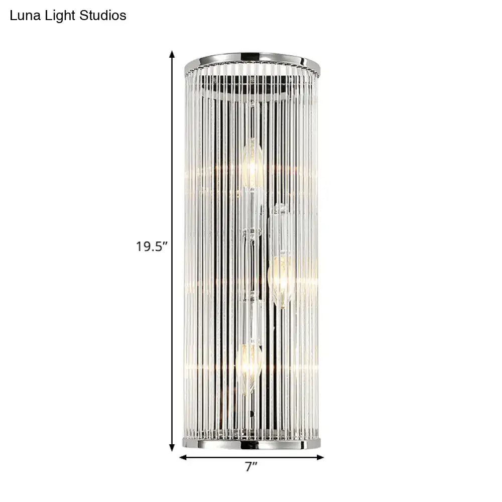 Contemporary chrome wall sconce with clear crystal tube for bedroom
