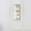 Contemporary chrome wall sconce with clear crystal tube for bedroom