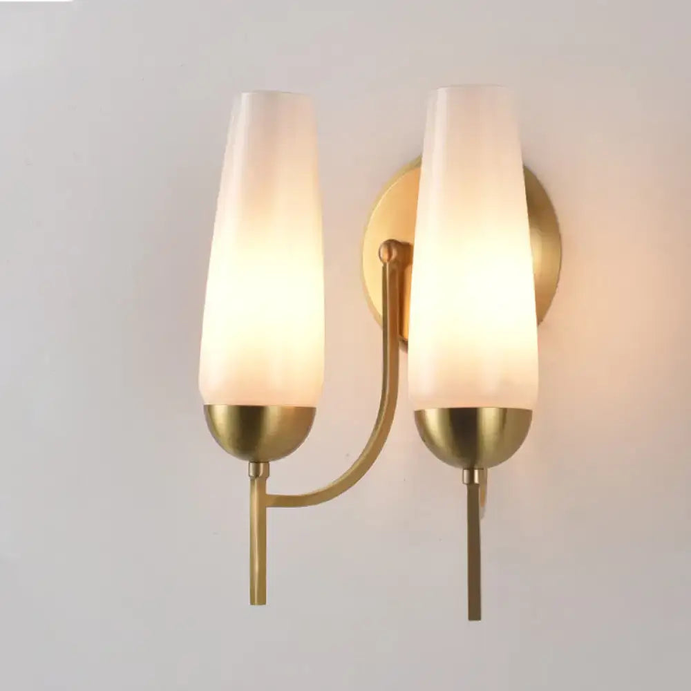 Contemporary gold and opal conical wall sconce bedroom light